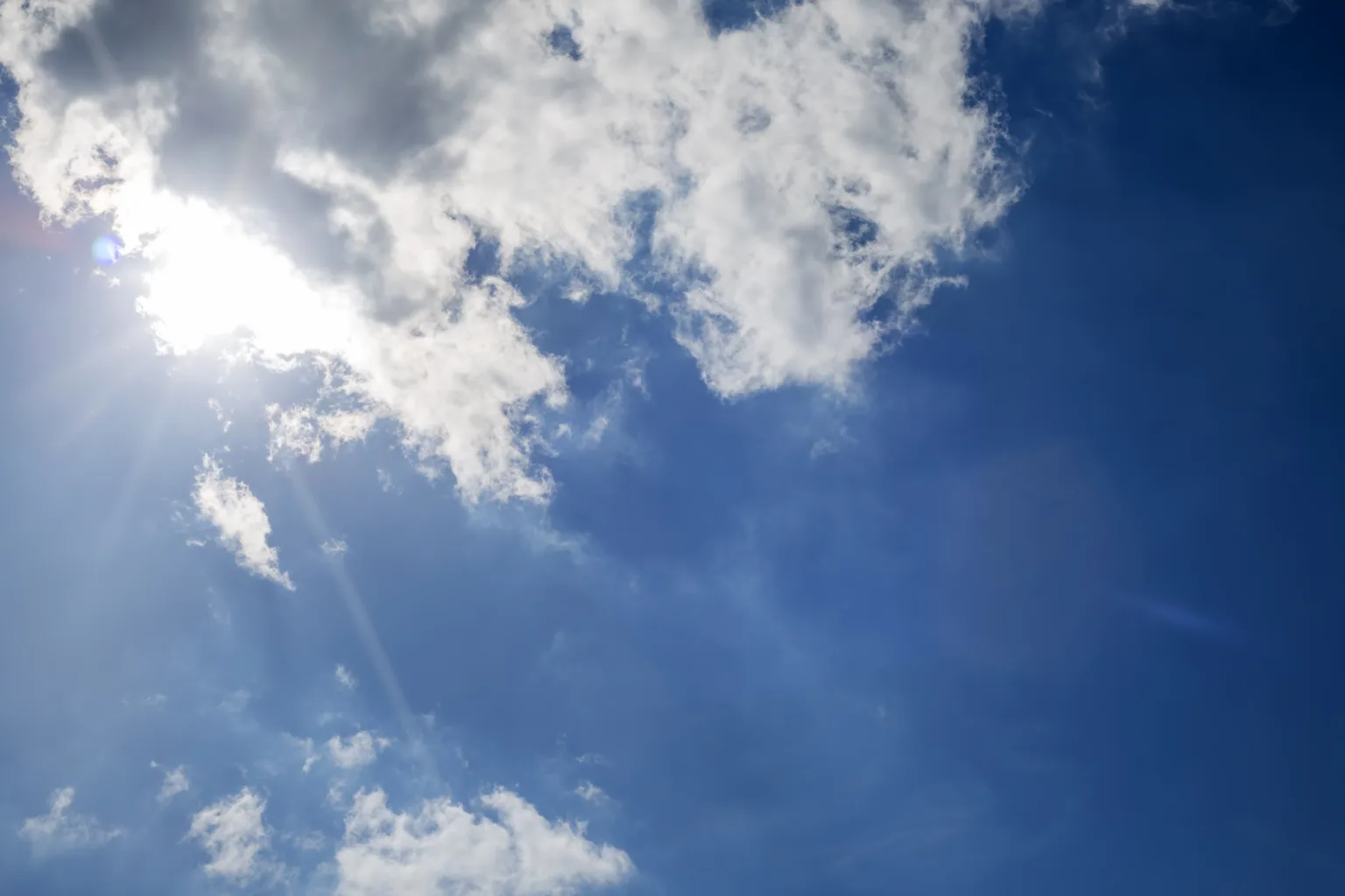 Blue sky background with clouds view. Nature photo.